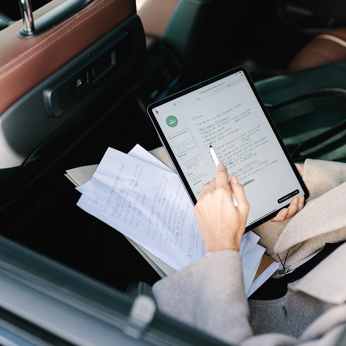 Woman note-taking with Nuwa Pen